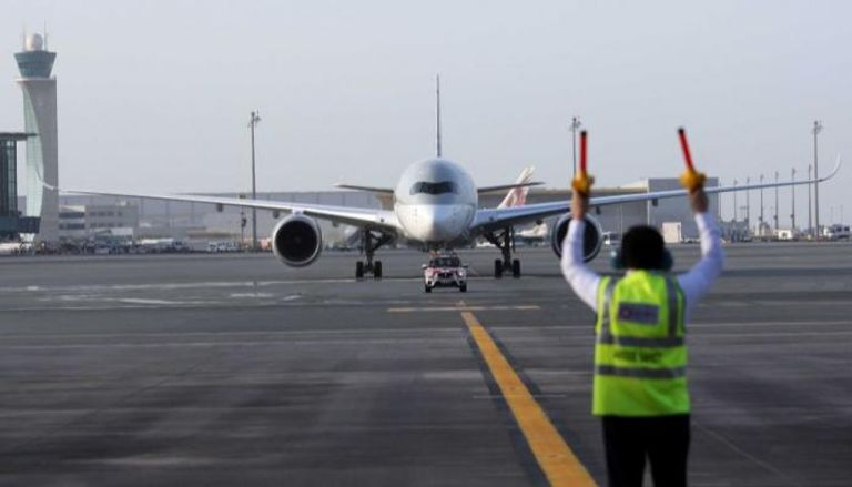 طائرة تابعة للخطوط القطرية في مطار الدوحة  