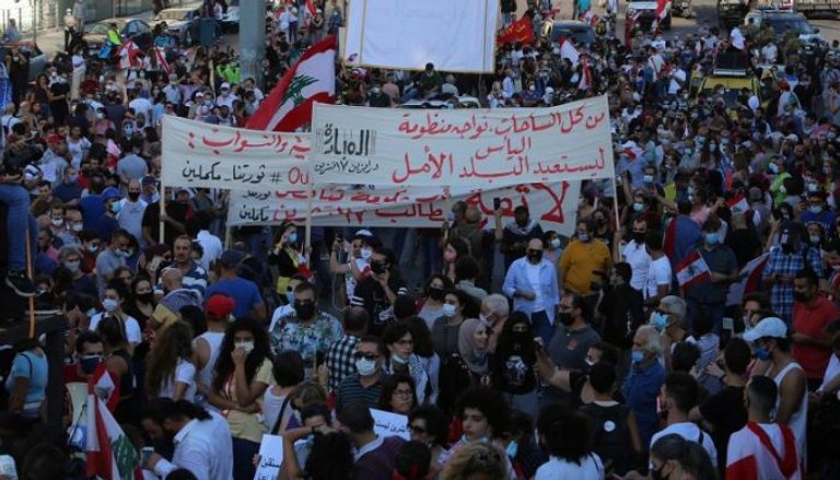 مظاهرة لبنانية حاشدة بذكرى مرور عام على انطلاق الاحتجاجات اللبنانية