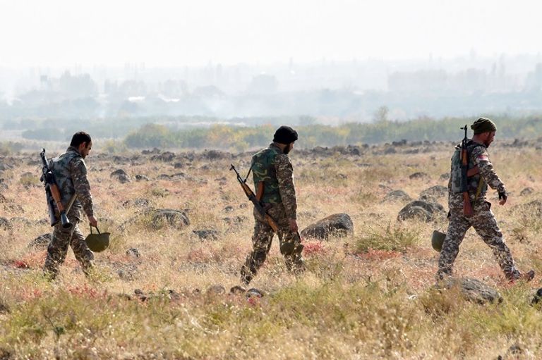 خط المواجهة في إقليم ناغورني قره باغ - أ.ف.ب جندي على خط المواجهة في إقليم ناغورني قره باغ - أ.ف.ب