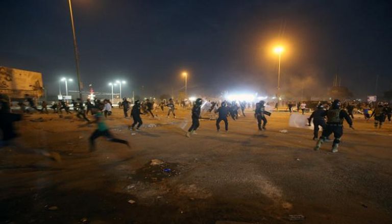 اشتباكات بين الأمن والمتظاهرين بالعراق - رويترز