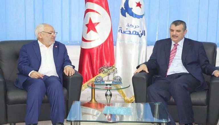 الهاشمي الحامدي مع زعيم إخوان تونس
