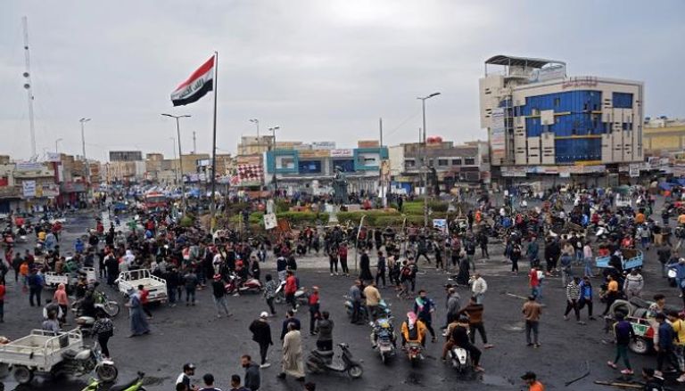 جانب من الاحتجاجات التي تشهدها مدن عراقية - أ.ف.ب 