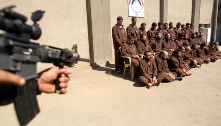 عناصر من تنظيم داعش في قبضة الأمن العراقي - أ.ف.ب