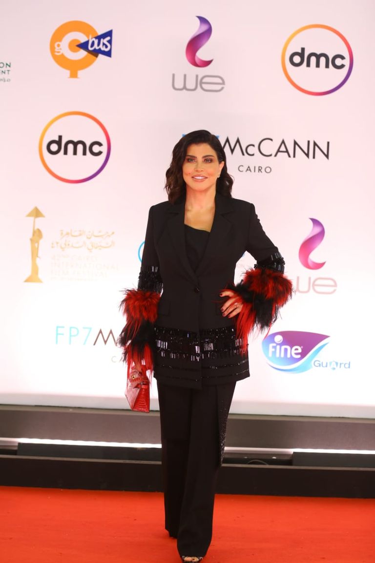 الفنان أحمد الفيشاوي وزوجته