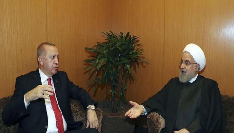 روحاني وأردوغان خلال لقاء سابق