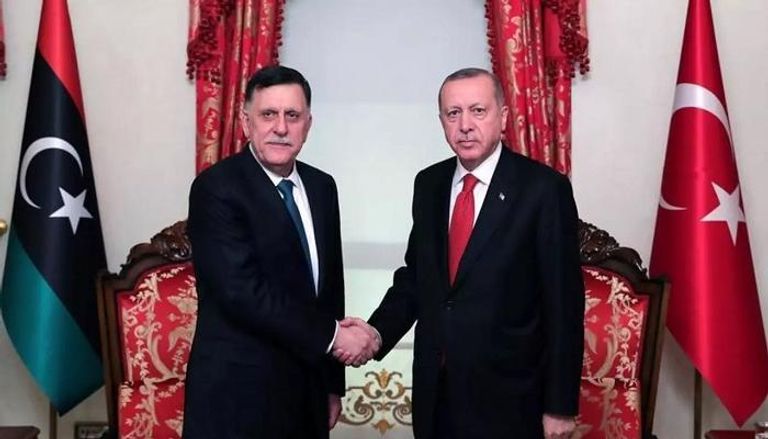 رجيب طيب أردوغان في لقاء سابق مع فايز السراج
