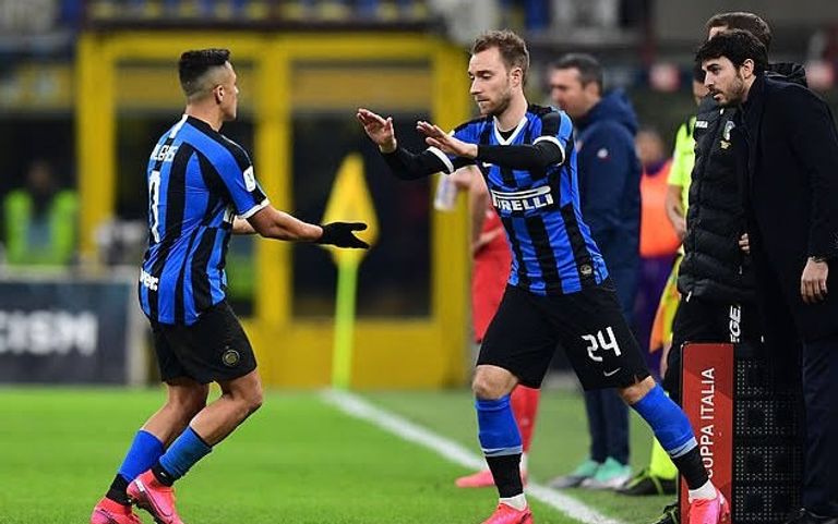 كريستيان إريكسن وأشلي يونج