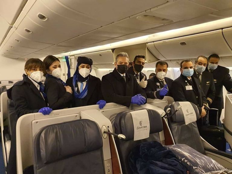 كواليس نقل المصريين من ووهان الصينية إلى العلمين