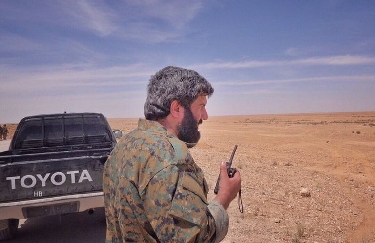 باشبور إلى جوار قاسم سليماني - أرشيفية