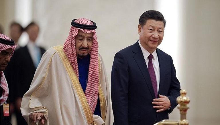 العاهل السعودي خلال لقاء سابق بالرئيس الصيني