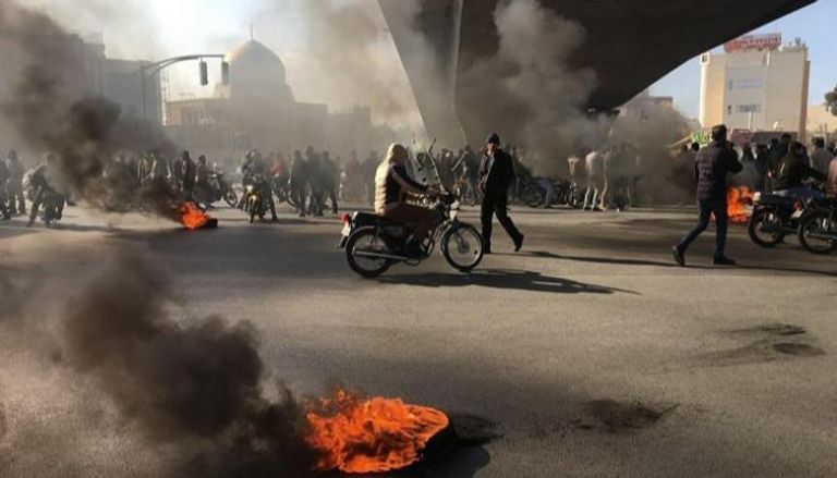 جانب من الاحتجاجات الإيرانية في نوفمبر - الأسوشيتد برس