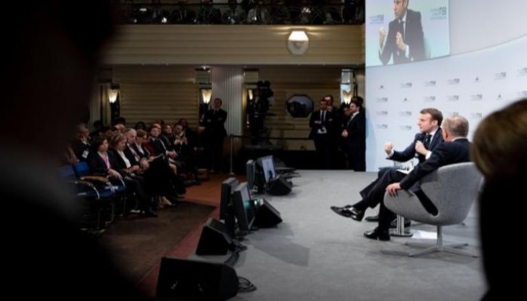 الرئيس الفرنسي إيمانويل ماكرون أثناء المؤتمر 