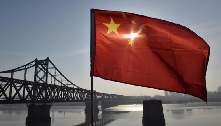 العلم الصيني يرفرف على جسر نهر يالو المكسور 