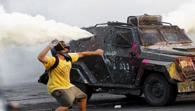 صدامات بين الأمن والمحتجين في تشيلي - رويترز