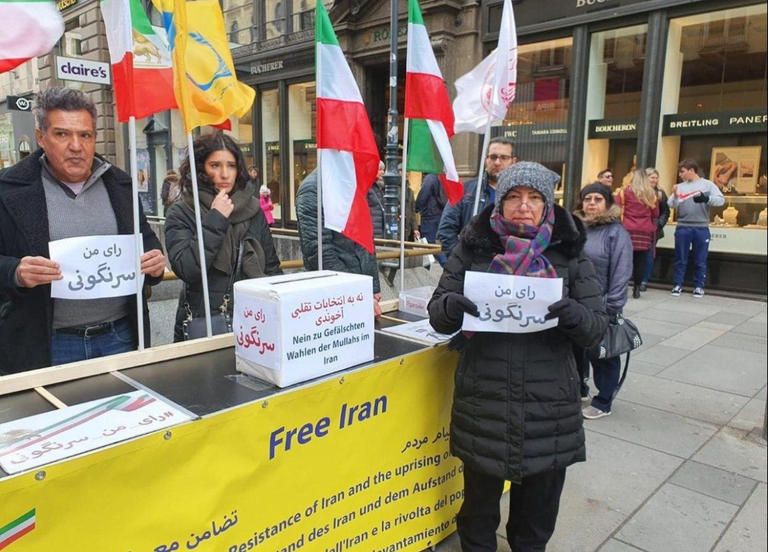 مظاهرة للمعارضة الإيرانية في باريس رفضا للانتخابات البرلمانية مركز اقتراع في إيران وسط حالة من العزوف عن المشاركة