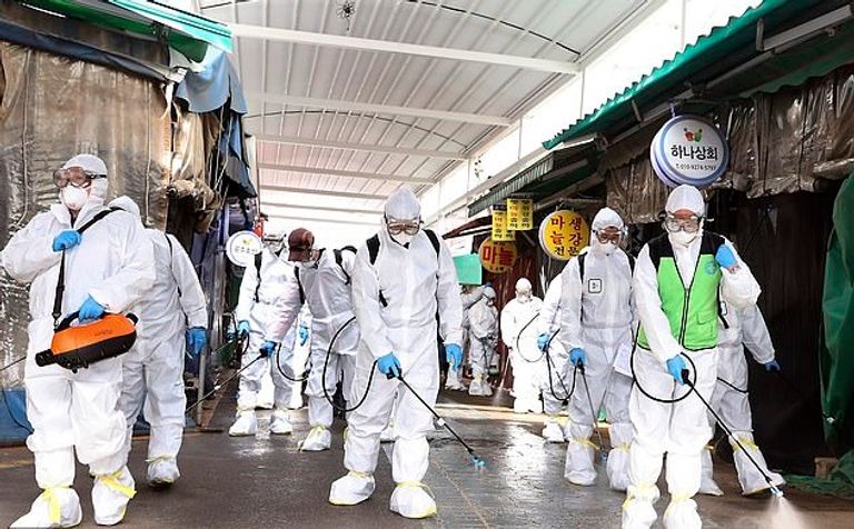 آلاف الكوريين يصطفون لشراء الكمامات