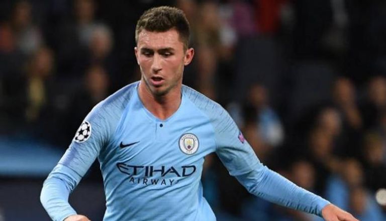 إيمريك لابورت بيب جوارديولا مدرب مانشستر سيتي