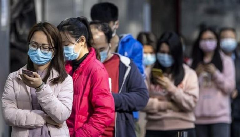السلطات الصينية طلبت من المواطنين ارتداء الكمامات كإجراء وقائي