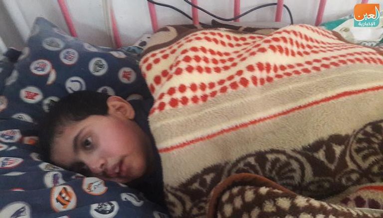 أحد الأطفال المرضى بالشلل الدماغي في غزة