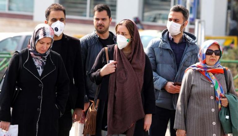 العراق اكتشف 13 حالة مصابة بفيروس كورونا