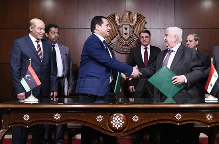 جانب من توقيع اتفاق عودة البعثات الدبلوماسية