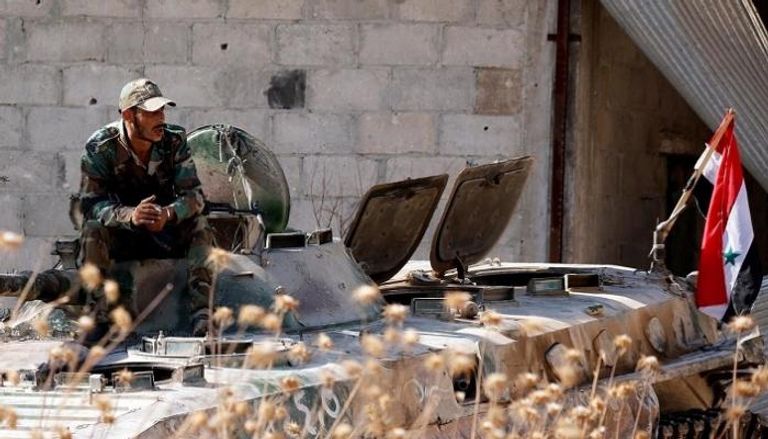 جندي سوري فوق آلية عسكرية- رويترز