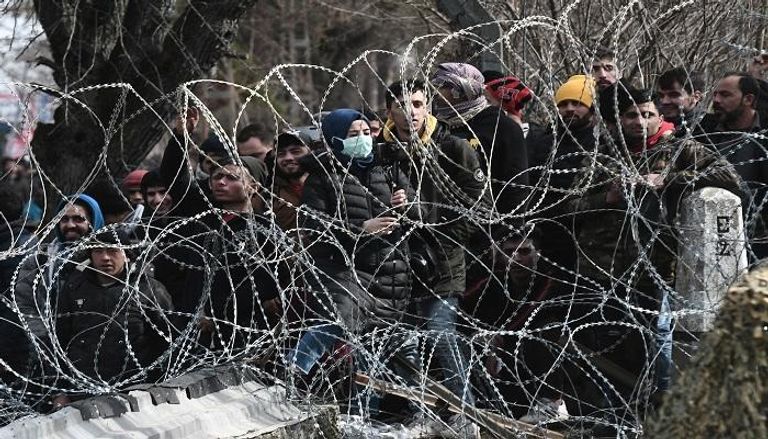 لاجئون على حدود اليونان- أ.ف.ب