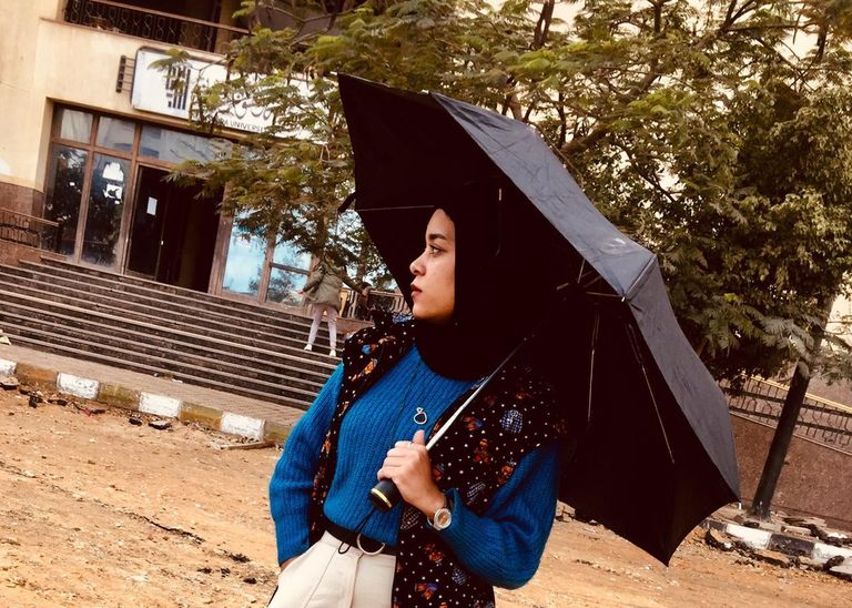 رانيا شلبي خلال مشاركتها في المسابقة العالمية للتصوير الجداري