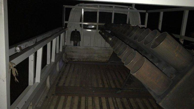 راجمة الكاتيوشا المستخدمة في قصف معسكر التحالف الدولي بالعراق أفراد من الجيش الأمريكي في العراق - رويترز