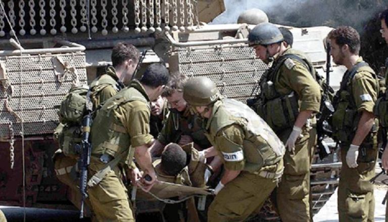 الجيش الإسرائيلي خلال تعامله مع مصاب بكورونا ضمن صفوفه