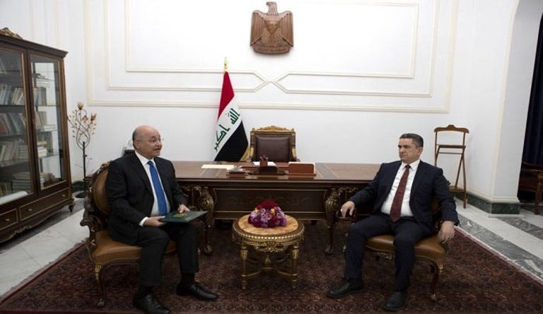 برهم صالح خلال استقباله الزرفي رئيس الوزراء العراقي المكلف عدنان الزرفي - أرشيفية