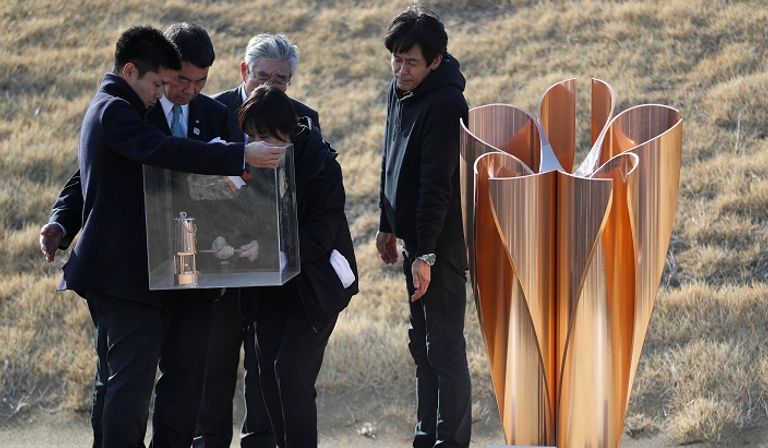 الشعلة الأولمبية تصل إلى طوكيو