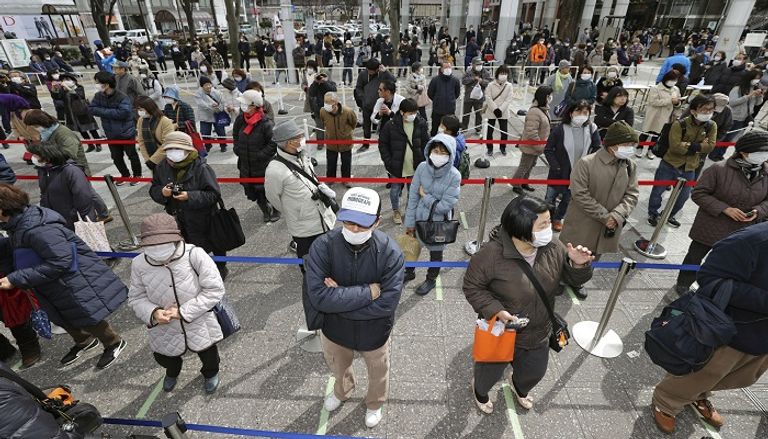 اليابانيون والشعلة الأولمبية