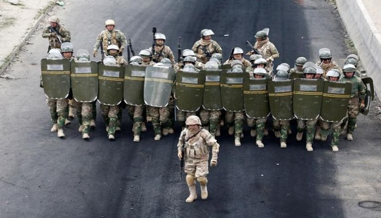 أفراد من قوات الأمن في بوليفيا - رويترز 