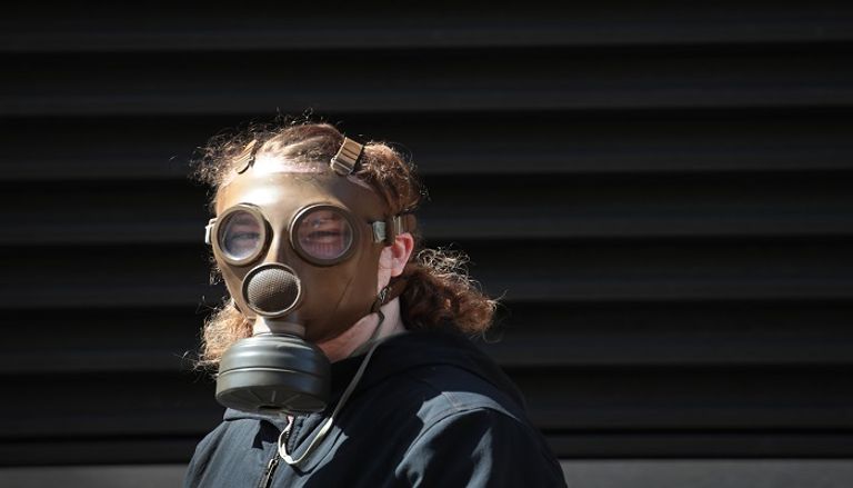 ناخبون في ويسكونسن يرتدون الكمامات - أ ف ب