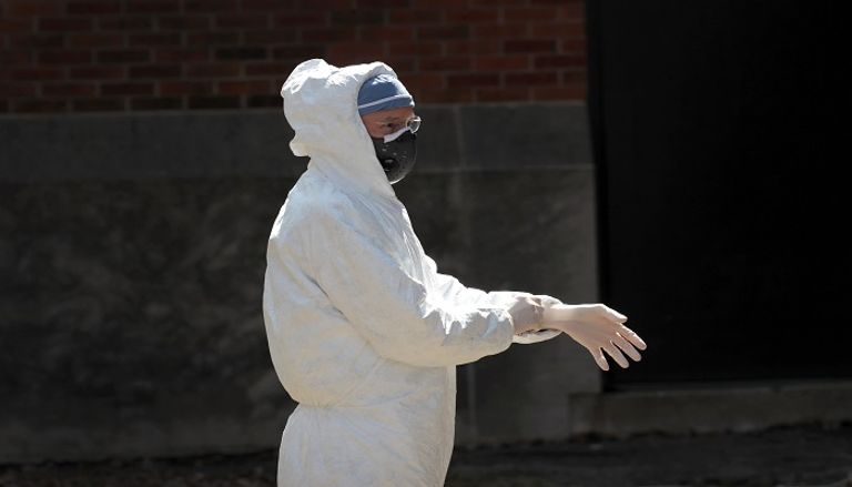 ناخبون في ويسكونسن يرتدون الكمامات - أ ف ب