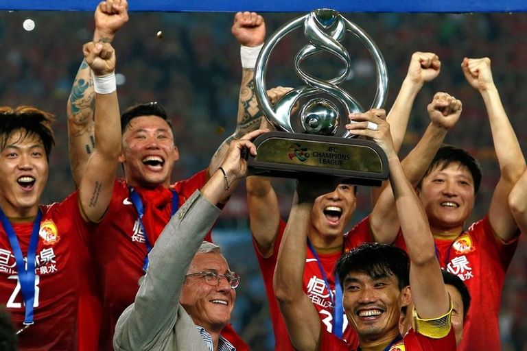 ليبي مع أبطال آسيا مارشيلو ليبي