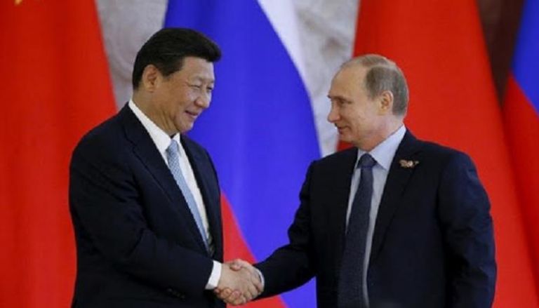 الرئيس الروسي فلاديمير بوتين ونظيره الصيني شي جين بينغ
