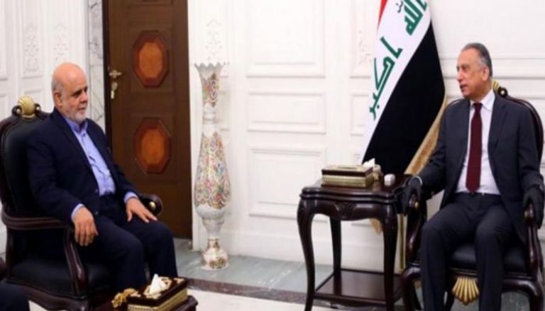   رئيس الوزراء العراقي مصطفى الكاظمي والسفير الإيراني إيرج مسجدي