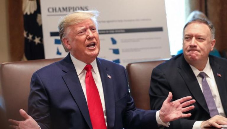 الرئيس الأمريكي دونالد ترامب ووزير الخارجية مايك بومبيو مايك بومبيو برفقة كلبه - أرشيفية