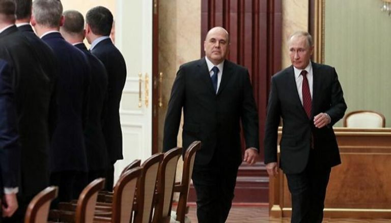 بوتين وميشوستين في طريقهما لأحد الاجتماعات - أرشيفية