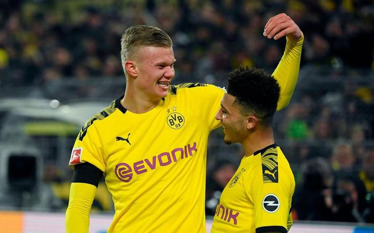 النرويجي إيرلينج هالاند والألماني جادون سانشو 