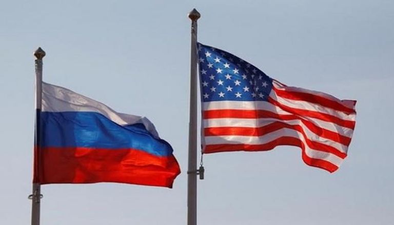 العلمان الأمريكي والروسي