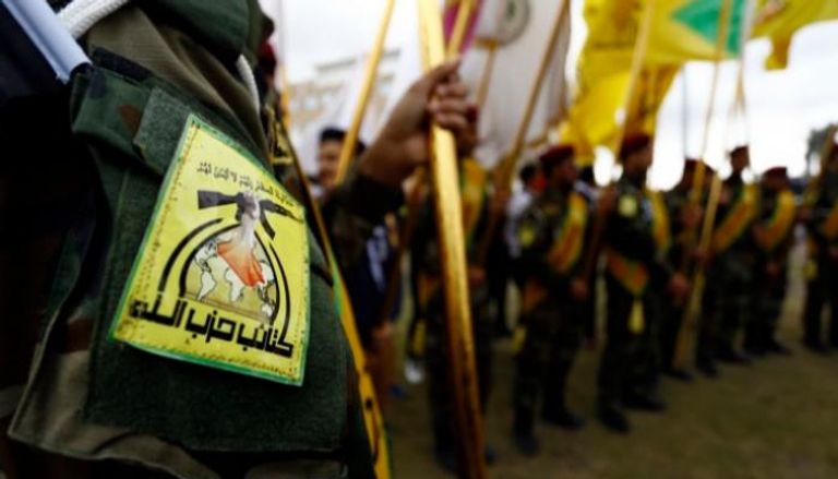 استعراض لعناصر تابعة كتائب حزب الله العراق- أرشيفية