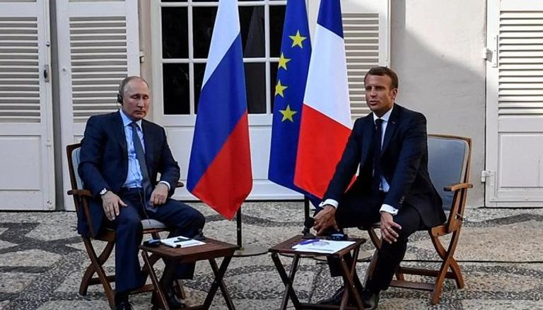 الرئيسان الروسي والفرنسي خلال لقاء سابق
