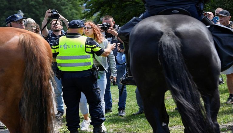 جانب من الاحتجاجات - أ.ف.ب جانب من الاحتجاجات - أ.ف.ب