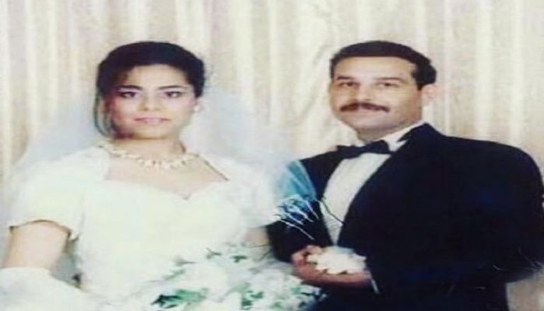 المقدم جمال مصطفى عبد الله السلطان وزوجته حلا صدام- أرشيفية
