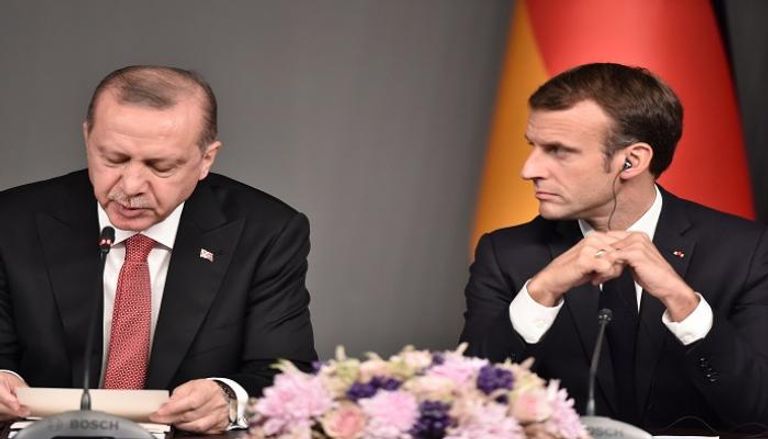 الرئيس الفرنسي ونظيره التركي خلال لقاء سابق 