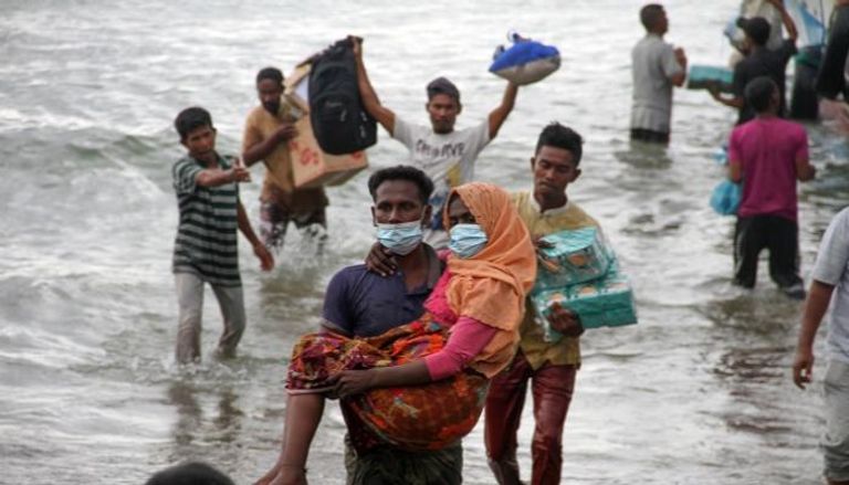 نازحون من الروهينجا خوفا من بطش جيش ميانمار - رويترز