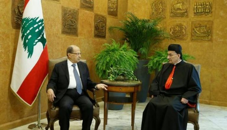 الرئيس اللبناني ميشال عون مع البطريرك بشارة الراعي - رويترز